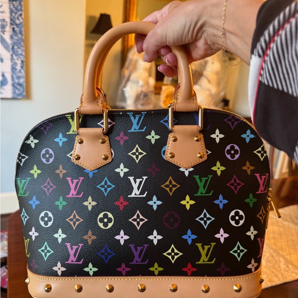 Louis Vuitton Black Satchel with Iconic Monogram and Dome Shape